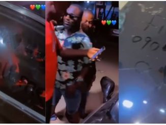 lady write number man car